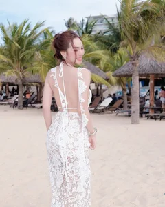 Viral TikToker Stuns in Sheer Lace Dress: A Masterclass in Beachfront Fashion - image 3