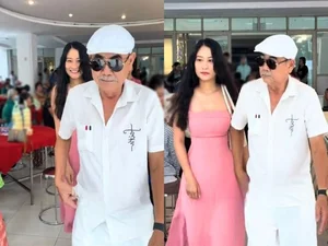 NSND Viet Anh and Girlfriend Turn Heads with Sweet Appearance at Public Event - image 2