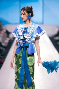 Miss Intercontinental Bao Ngoc Commands the Catwalk in a Vibrant Floral Inspired Couture Masterpiece - image 8