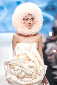 Miss Intercontinental Bao Ngoc Commands the Catwalk in a Vibrant Floral Inspired Couture Masterpiece - image 17