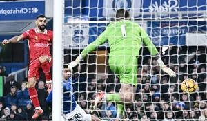Red Card Drama: Liverpool Battles Hard to Retain Premier League Top Spot - image 2