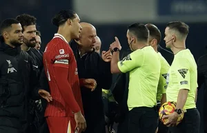 Red Card Drama: Liverpool Battles Hard to Retain Premier League Top Spot - image 3