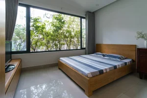 Inside a 50m2 Urban Townhouse: Maximizing Light and Greenery - image 1