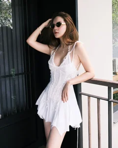 Singer Pham Quynh Anh Stuns in Elegant Swimwear Photoshoot - image 4