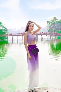 U40 Vietnamese Beauty Queen Flaunts Tasteful Swimsuit Figure - image 2