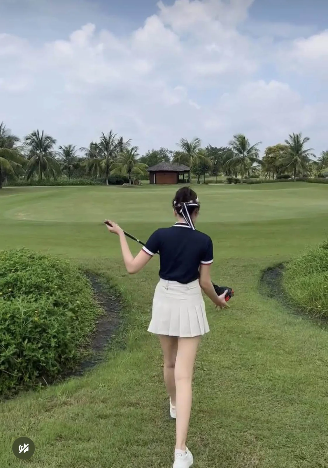 Miss Vietnam Do Ha Turns Heads in Chic Golf Outfit Showing Off Stunning Legs