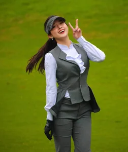 Miss Vietnam Do Ha Turns Heads in Chic Golf Outfit Showing Off Stunning Legs - image 4