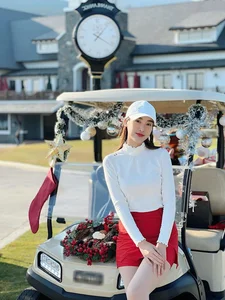 Miss Vietnam Do Ha Turns Heads in Chic Golf Outfit Showing Off Stunning Legs - image 6
