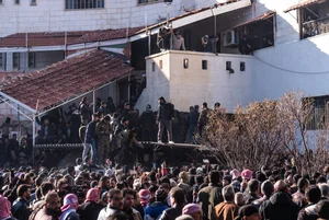 Families Rush to Notorious Syrian Prisons in Search of Missing Loved Ones - image 11