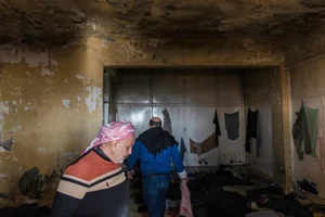 Families Rush to Notorious Syrian Prisons in Search of Missing Loved Ones - image 6