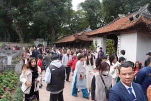 Hanoi Historic Sites Welcome Tens of Thousands of Tourists During Tet Lunar New Year Festival - image 7