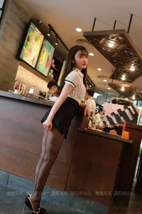 Modern Street Style: Qiu Qiu in Patterned Black Hosiery by IESS - image 0