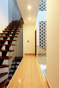 Innovative West-Facing House Design with Hollow Brick Facade - image 3