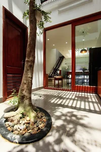 Innovative West-Facing House Design with Hollow Brick Facade - image 4