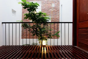Innovative West-Facing House Design with Hollow Brick Facade - image 8