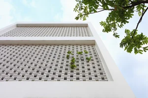 Innovative West-Facing House Design with Hollow Brick Facade - image 10