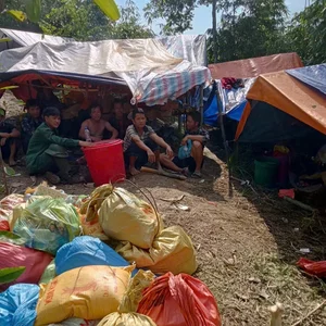 Lao Cai Village Chief's Heroic Evacuation Saves 115 Lives from Landslide - image 1