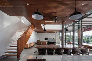 Discover the Unique Laterite Stone House with an Innovative Folding Roof in Saigon - image 7