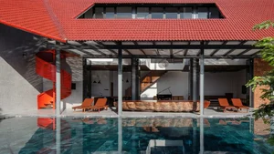 Discover the Unique Laterite Stone House with an Innovative Folding Roof in Saigon - image 1