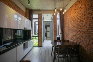 Stunning Combined Residence and Coffee Shop Design in Da Nang - image 5