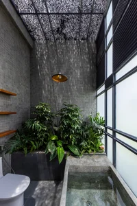 Beat the Heat: Stunning Tropical House Design in Bustling Saigon - image 2