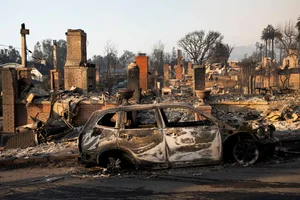 Devastating Aftermath: Los Angeles Transforms into a 'War Zone' Following Wildfires - image 9