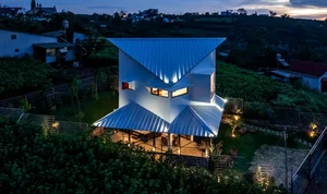 The Unique Folding Roof House with a One-of-a-Kind Rotating Angle in Lam Dong - image 1