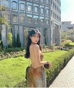 Korean Plus-Size Model Redefines Beauty Standards in a Backless Silk Dress - image 0