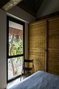 Tropical Twin Houses: Multi-Generational Living Harmonized with Nature in Tra Vinh - image 10