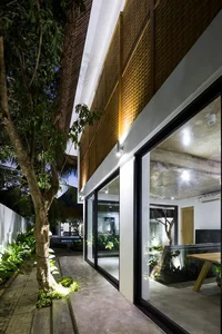 Tropical Twin Houses: Multi-Generational Living Harmonized with Nature in Tra Vinh - image 3