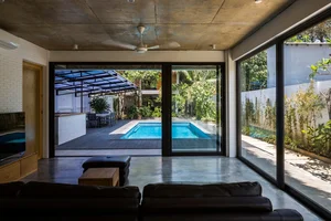 Tropical Twin Houses: Multi-Generational Living Harmonized with Nature in Tra Vinh - image 6