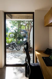 Tropical Twin Houses: Multi-Generational Living Harmonized with Nature in Tra Vinh - image 22