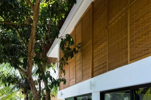 Tropical Twin Houses: Multi-Generational Living Harmonized with Nature in Tra Vinh - image 16