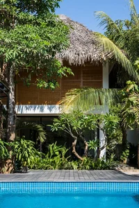 Tropical Twin Houses: Multi-Generational Living Harmonized with Nature in Tra Vinh - image 7