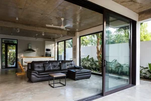 Tropical Twin Houses: Multi-Generational Living Harmonized with Nature in Tra Vinh - image 21