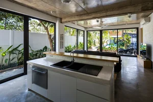 Tropical Twin Houses: Multi-Generational Living Harmonized with Nature in Tra Vinh - image 11