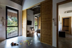 Tropical Twin Houses: Multi-Generational Living Harmonized with Nature in Tra Vinh - image 8