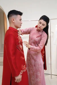 Footballer Quang Hai and Wife to Wear Traditional Sacred Bird Ao Dai - image 2