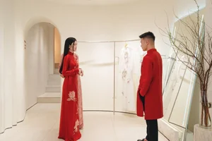 Footballer Quang Hai and Wife to Wear Traditional Sacred Bird Ao Dai - image 4