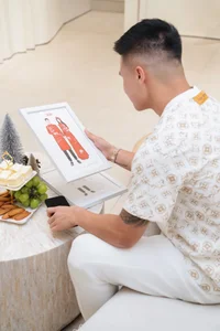 Footballer Quang Hai and Wife to Wear Traditional Sacred Bird Ao Dai - image 5