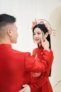 Footballer Quang Hai and Wife to Wear Traditional Sacred Bird Ao Dai - image 6