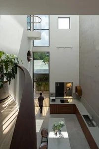 Vesp House: A Vintage Vespa-Inspired Home with Open-Concept Family Spaces - image 4