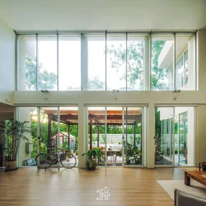 Turning a 40-Year-Old House into a Lush Green Home Office for a Multigenerational Family - image 0