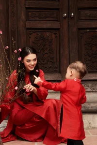 Dianka Zakhidova and Bui Tien Dung Wear Ao Dai for Tet Photoshoot - image 7