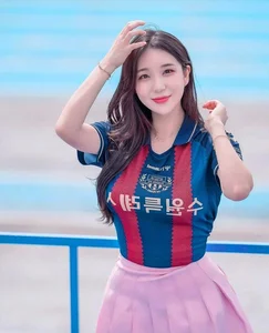Stunning Cheerleader Captivates Fans with Athletic Grace and Dynamic Energy - image 1