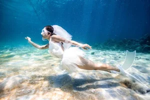 Ethereal Underwater Beauty: A Bride’s Unique Scuba Diving Photoshoot - image 3