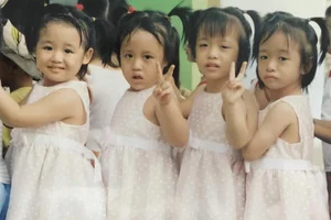 The Miracle of Four: Viral Family Shares Journey Raising Quadruplet Sisters Conceived via IVF - image 1