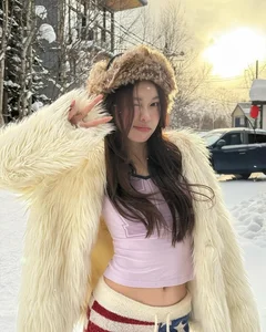 Braving the Cold: Viral TikToker Stuns in Bikini Amidst Snowy Winter Landscape - image 0