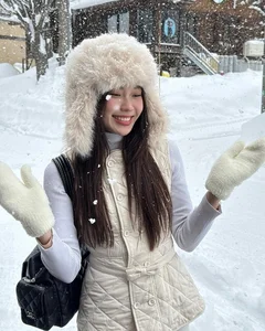 Braving the Cold: Viral TikToker Stuns in Bikini Amidst Snowy Winter Landscape - image 5