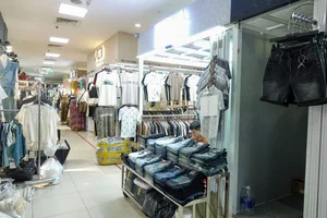 The Modern Dilemma: Traditional Market Vendors Struggle in the E-Commerce Era - image 10